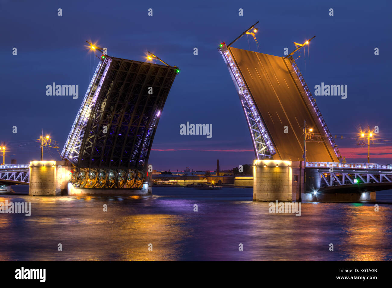 Night view on illumunated open Palace Bridge and Neva River, St. Petersburg, Russia Stock Photo