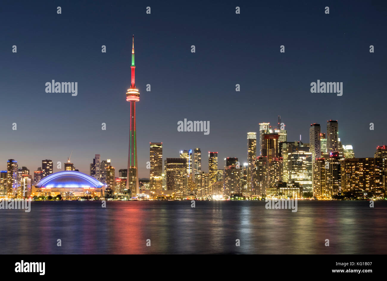 Toronto Skyline featuring the CN Tower at night, from Toronto Island, Toronto, Ontario, Canada Stock Photo