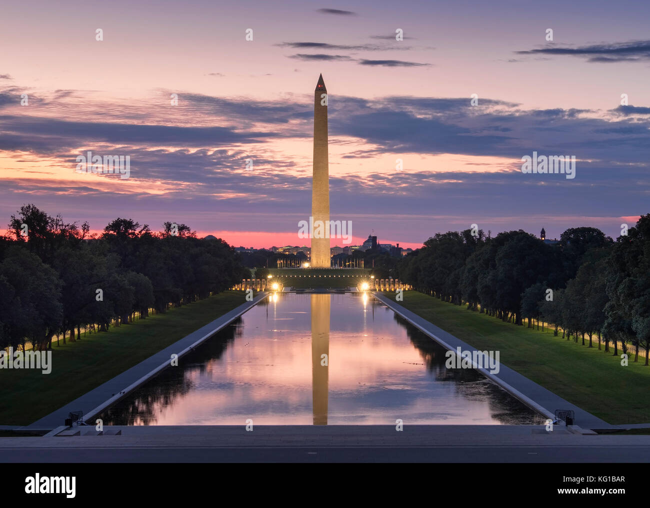 The Washington Monument and Reflecting Pool at sunrise, National Mall, Washington DC, USA Stock Photo