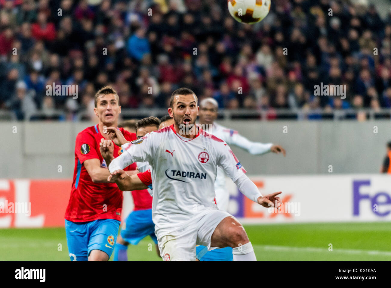 November 2, 2017: Ben Sahar #14 (Hapoel Beer-Sheva) and Ionut Larie #3 (FCSB Bucharest)  during the UEFA Europa League 2017-2018, Group Stage, Groupe G game between FCSB Bucharest (ROU) and Hapoel Beer-Sheva FC (ISR) at National Arena Stadium, Bucharest,  Romania ROU. Foto: Cronos/Catalin Soare Stock Photo