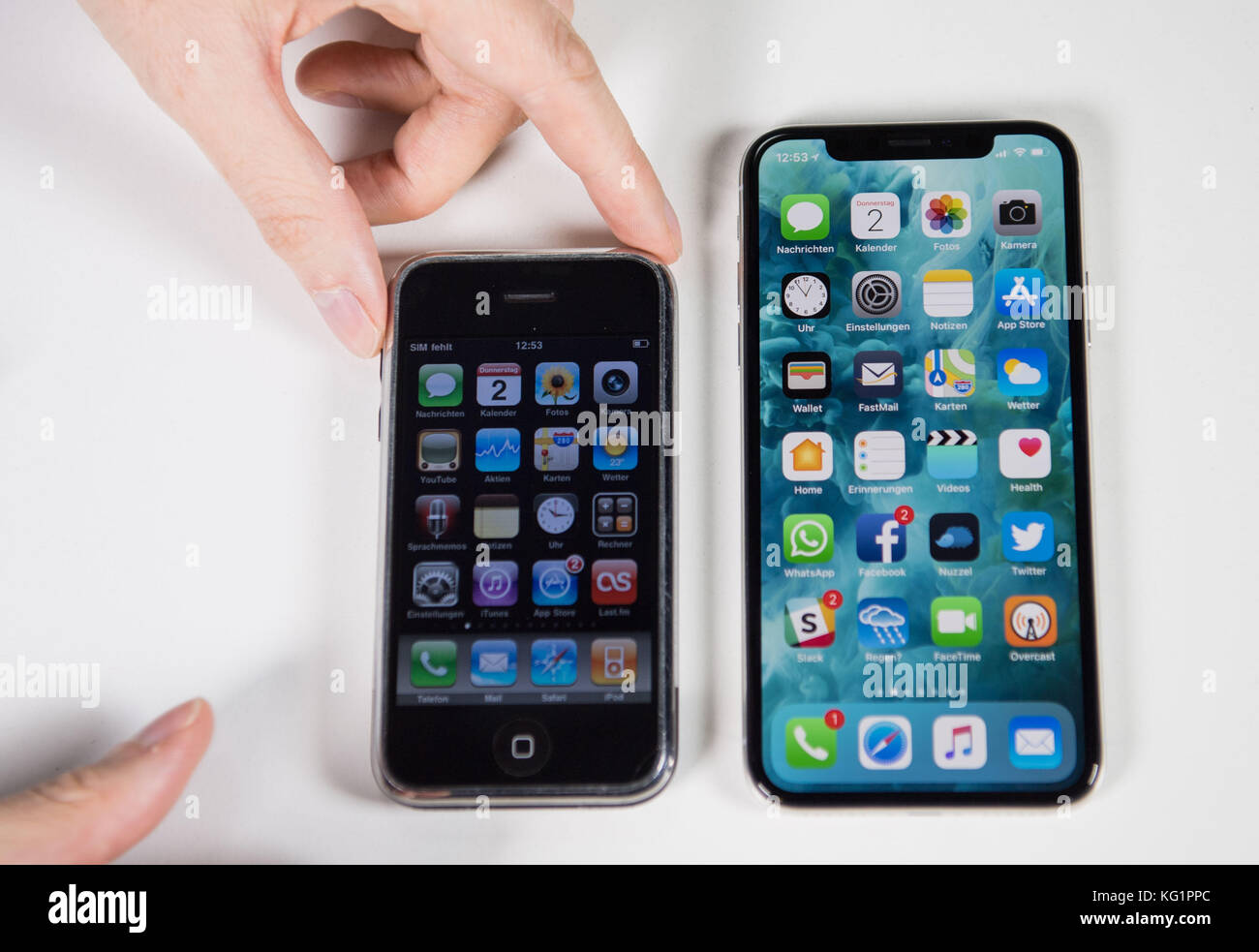 Berlin, Germany. 2nd Nov, 2017. ILLUSTRATION - An iPhone X lies on a table next to an iPhone of the first generation in Berlin, Germany, 2 November 2017. The sale of the iPhone X in Germany starts on 3 November 2017. Credit: Lino Mirgeler/dpa/Alamy Live News Stock Photo