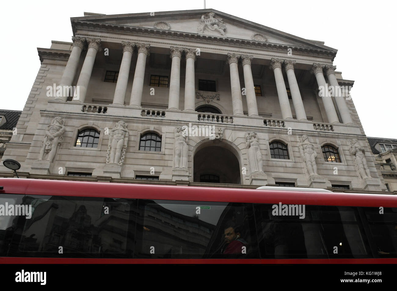 A London Bus Passes The Bank Of England In London Which Has Hiked   A London Bus Passes The Bank Of England In London Which Has Hiked KG1WJ8 