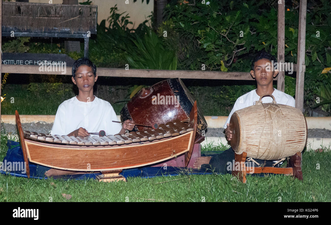 Small ensemble of Cambodian musicians playing traditional instruments Stock Photo