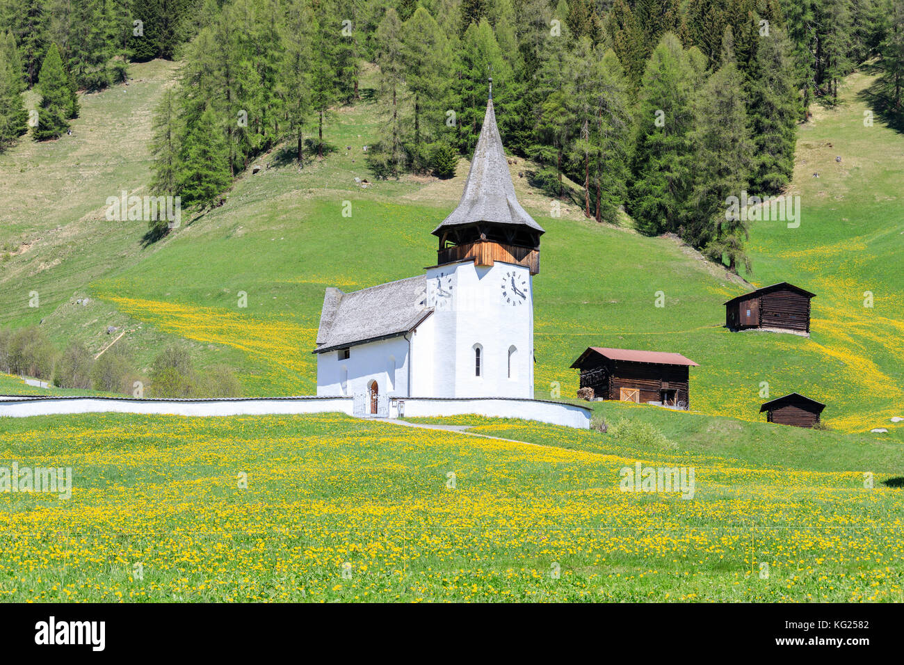 Alpine church and huts, Davos, Canton of Graubunden, Prettigovia Davos Region, Switzerland, Europe Stock Photo