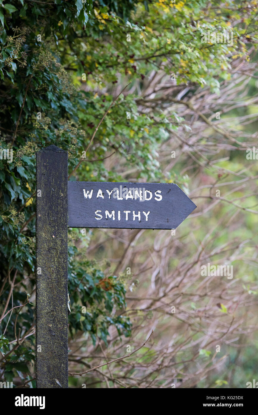 Waylands Smithy signpost in autumn. Neolithic chambered long barrow along the Ridgeway, Ashbury, Oxfordshire, England. Stock Photo