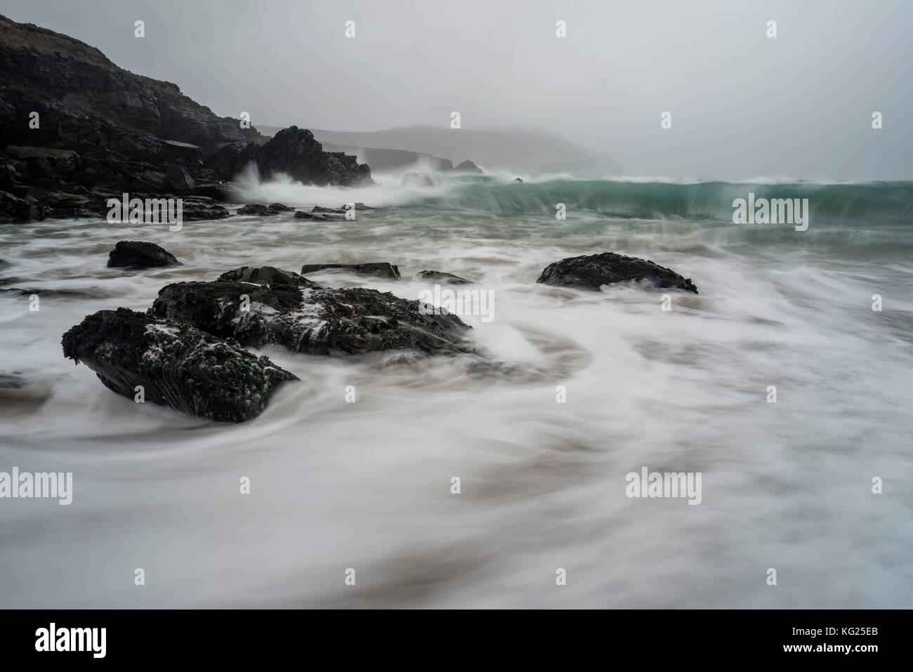 Incoming tide, Clogher Bay, Clogher, Dingle Peninsula, County Kerry, Munster, Republic of Ireland, Europe Stock Photo