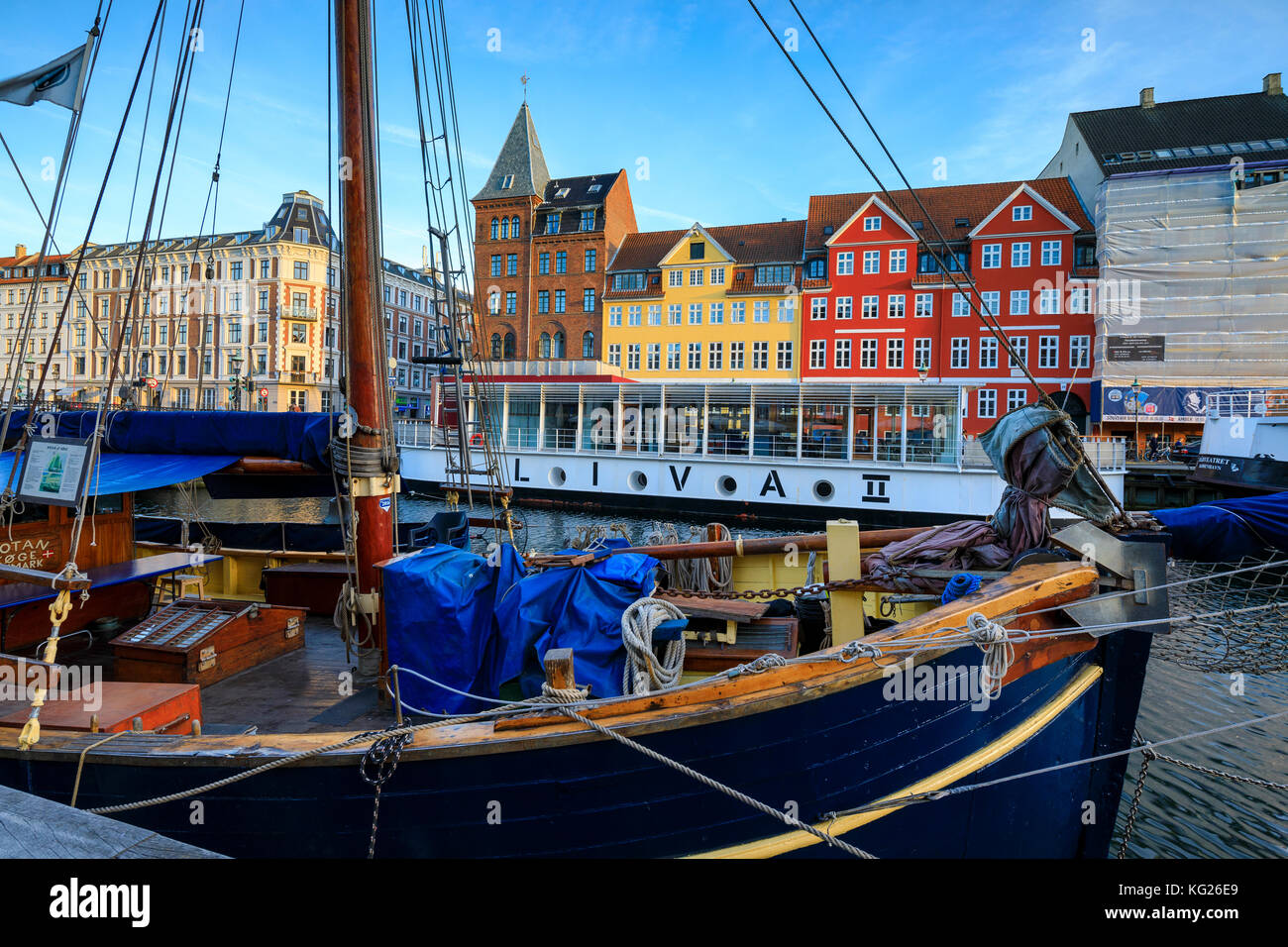Boats in Christianshavn Canal with typical colourful houses in the background, Copenhagen, Denmark, Europe Stock Photo
