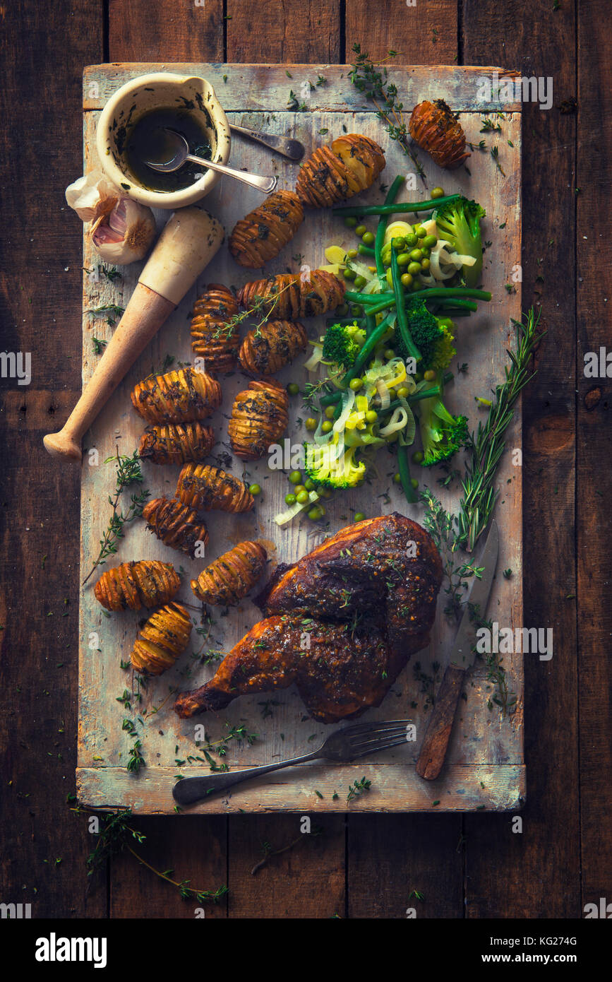 Roast Chicken with Hasselback potatoes Stock Photo Alamy