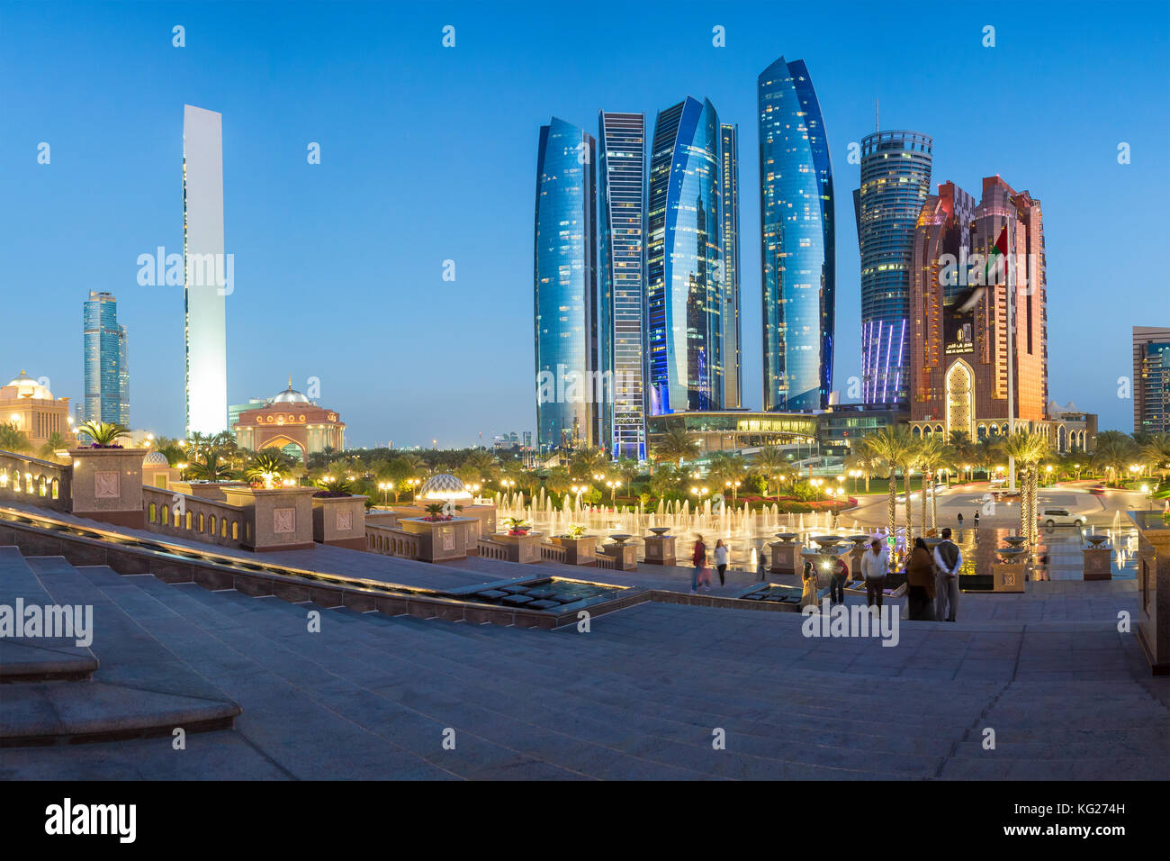 Etihad Towers viewed over the fountains of the Emirates Palace Hotel, Abu Dhabi, United Arab Emirates, Middle East Stock Photo