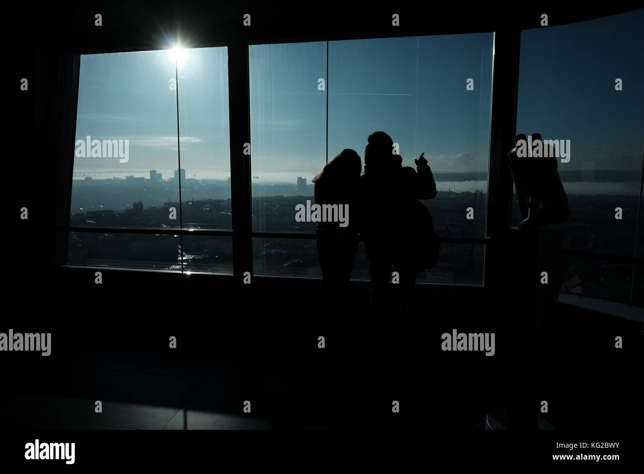 Young couple viewing the winter Prague from the Zizkov Television Tower observatory, Prague, Czech Republic Stock Photo