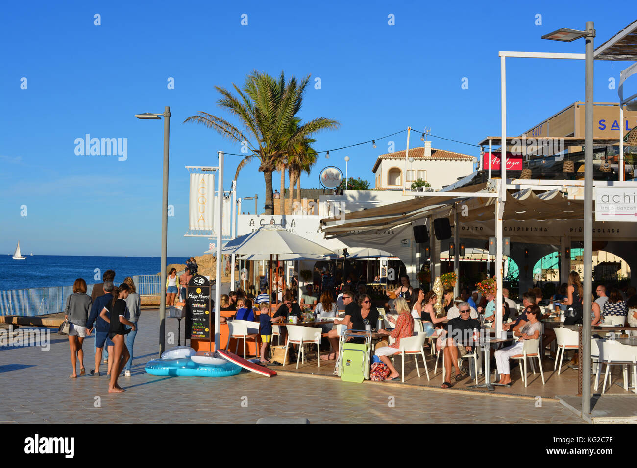People at Acqua on the Arenal Beach, early evening in October, Javea, Alicante, Spain Stock Photo