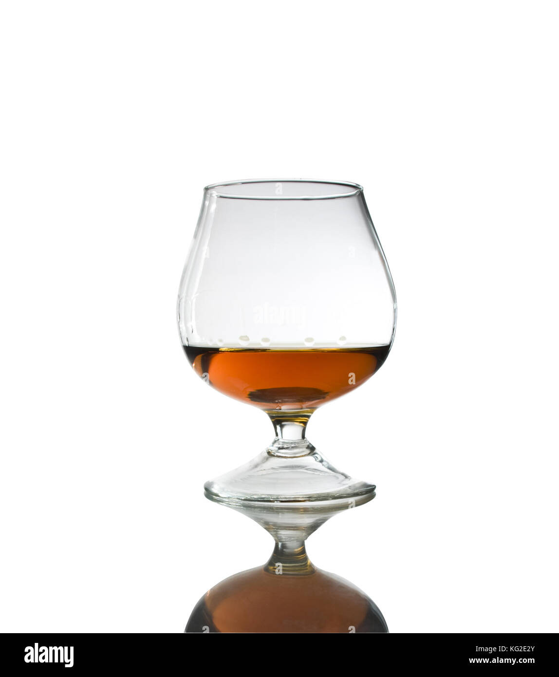Snifter glass of cognac on white background Stock Photo Alamy