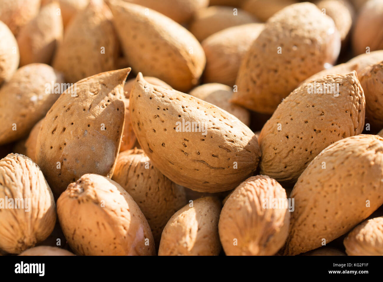 Group of raw almonds, background. Main ingredient for nougat Sicilian