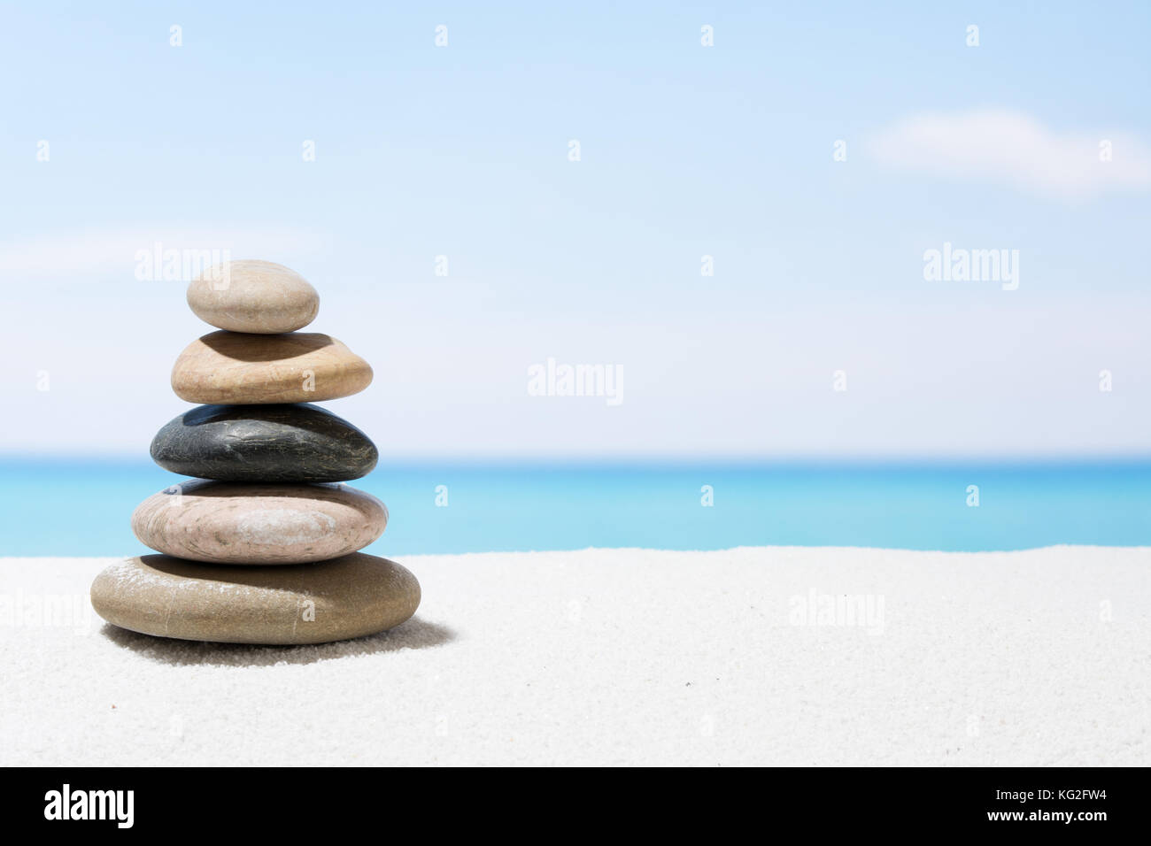 Sand Stack Relaxing in the tropical beach, with white sand and stack of stones ...