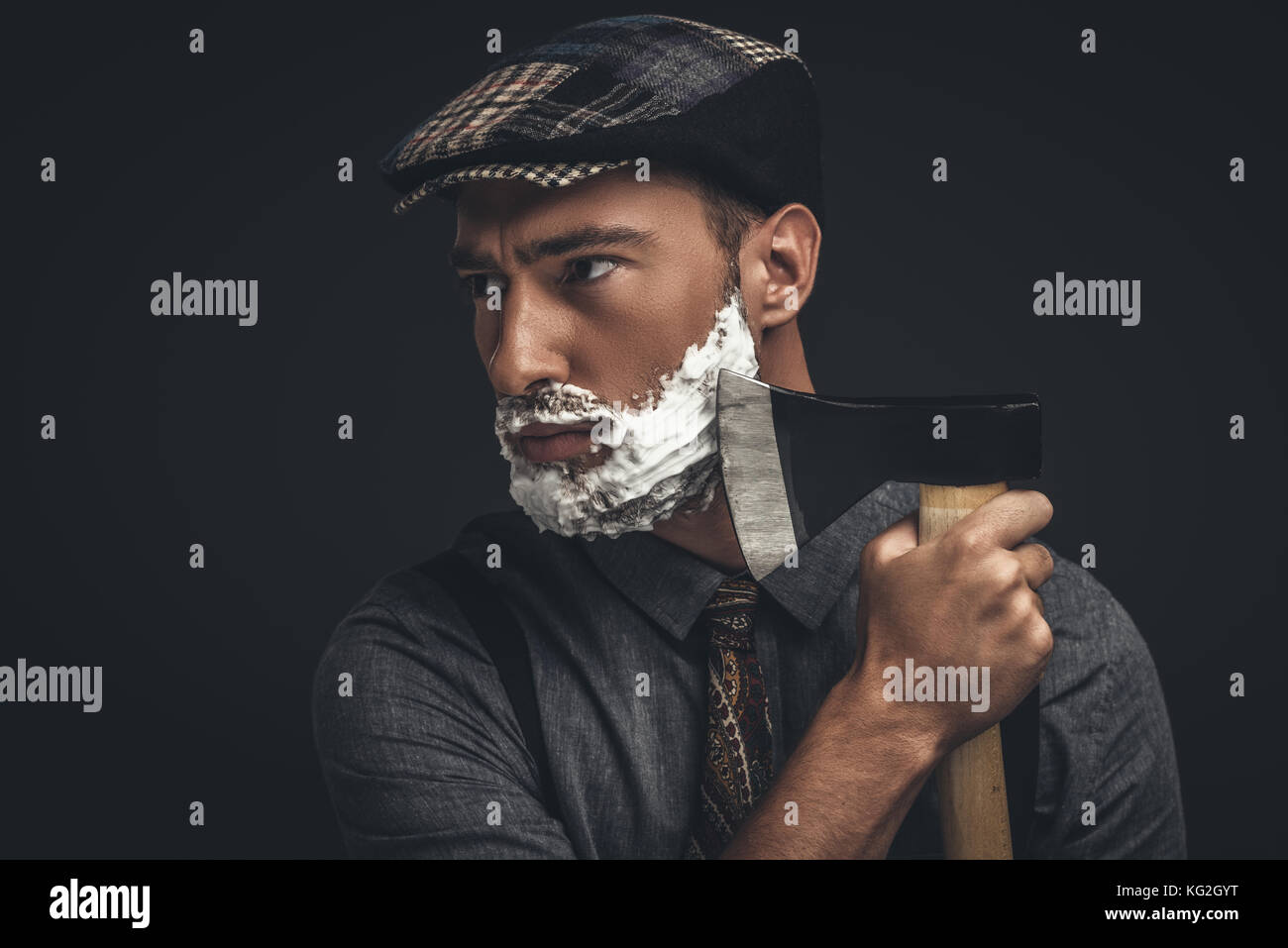 man shaving with axe Stock Photo Alamy