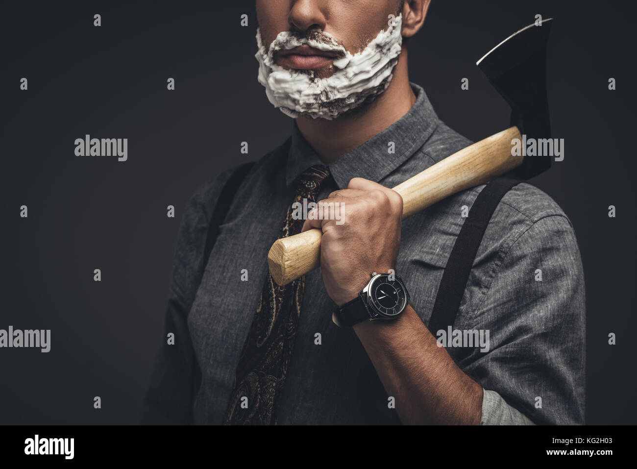 Man in shaving cream holding axe Stock Photo Alamy