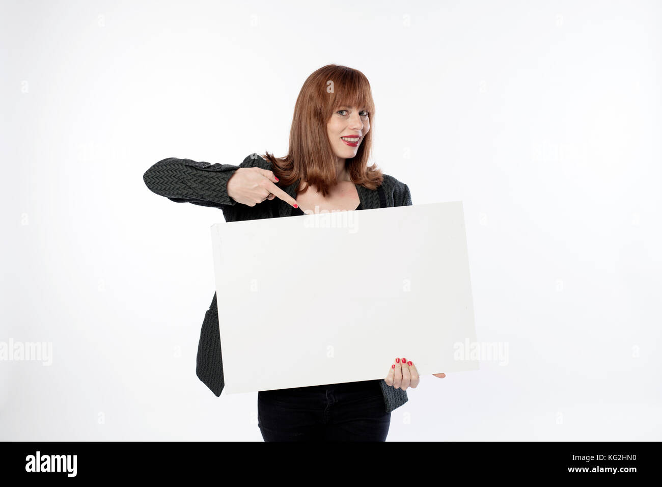woman holding a sign Stock Photo - Alamy