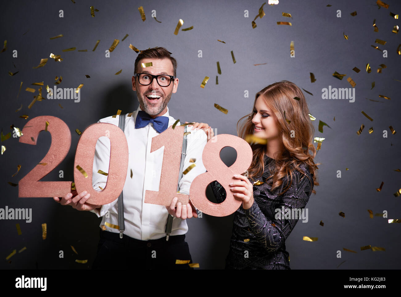 Celebrating new year in studio shot Stock Photo