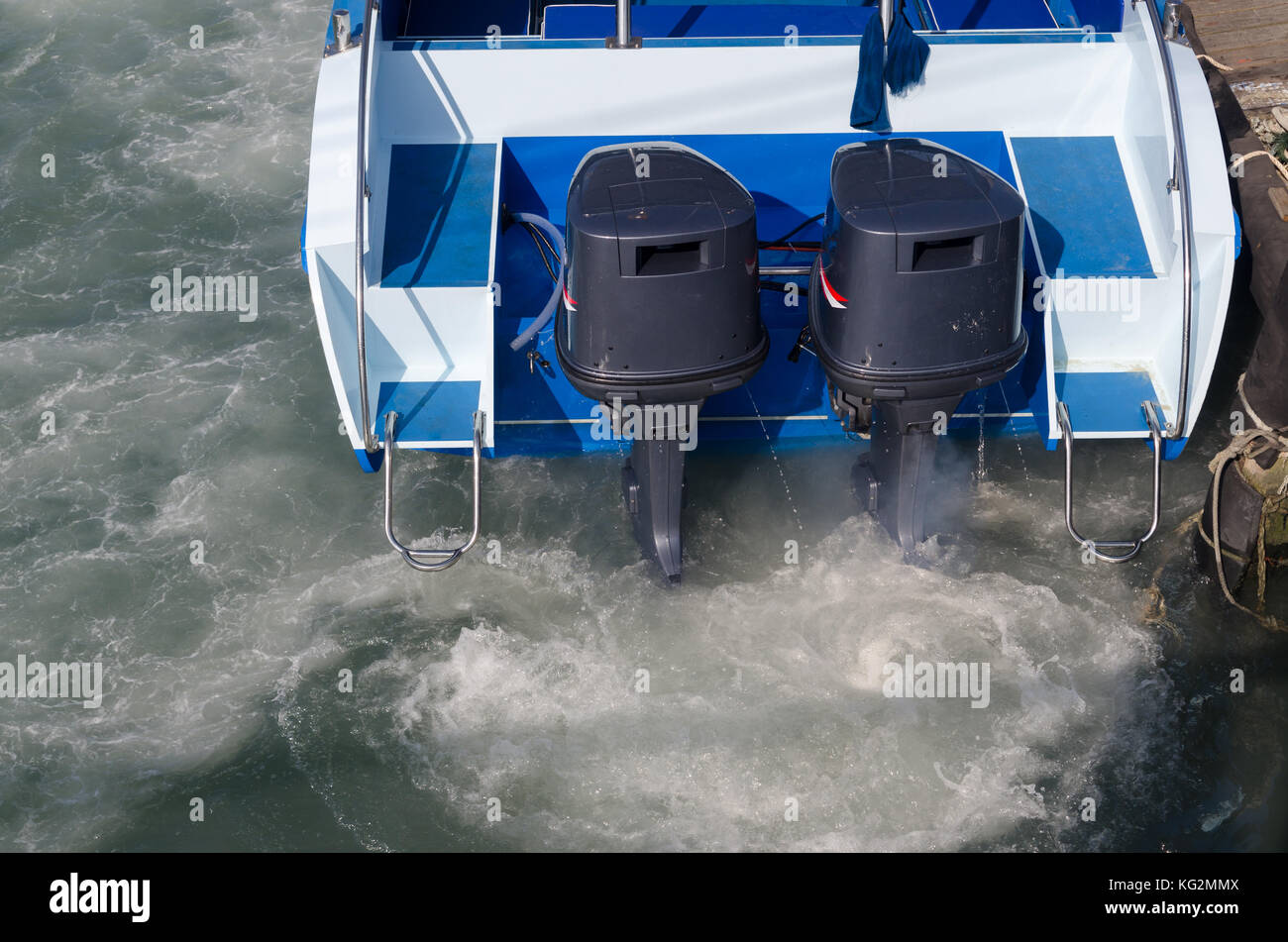 Boat engines tune up rear view of speed boat running Stock Photo Alamy