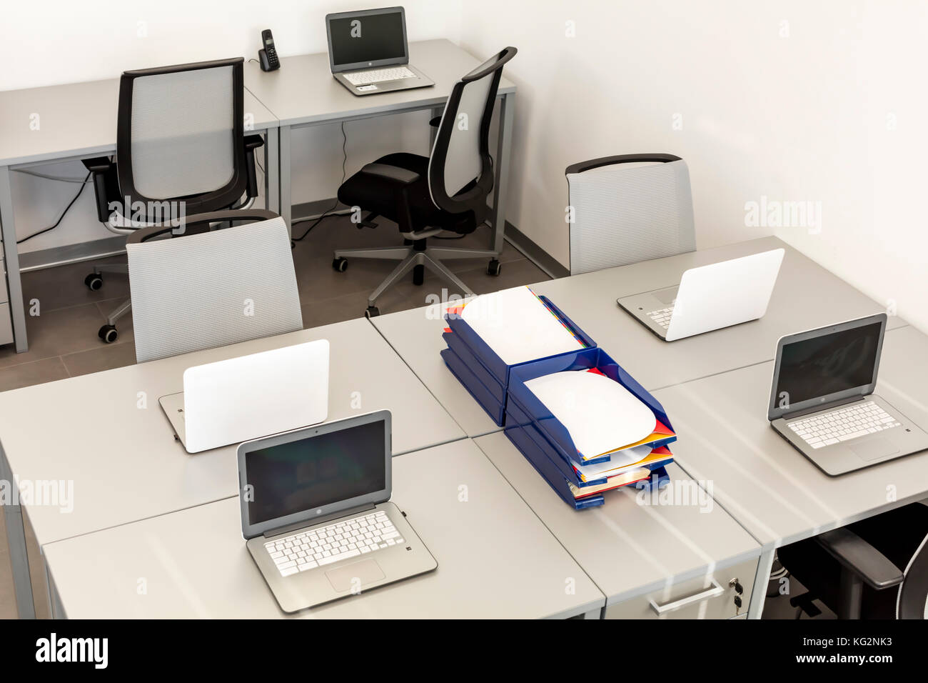 Modern Office Space With Desks And Laptops Stock Photo 164788711