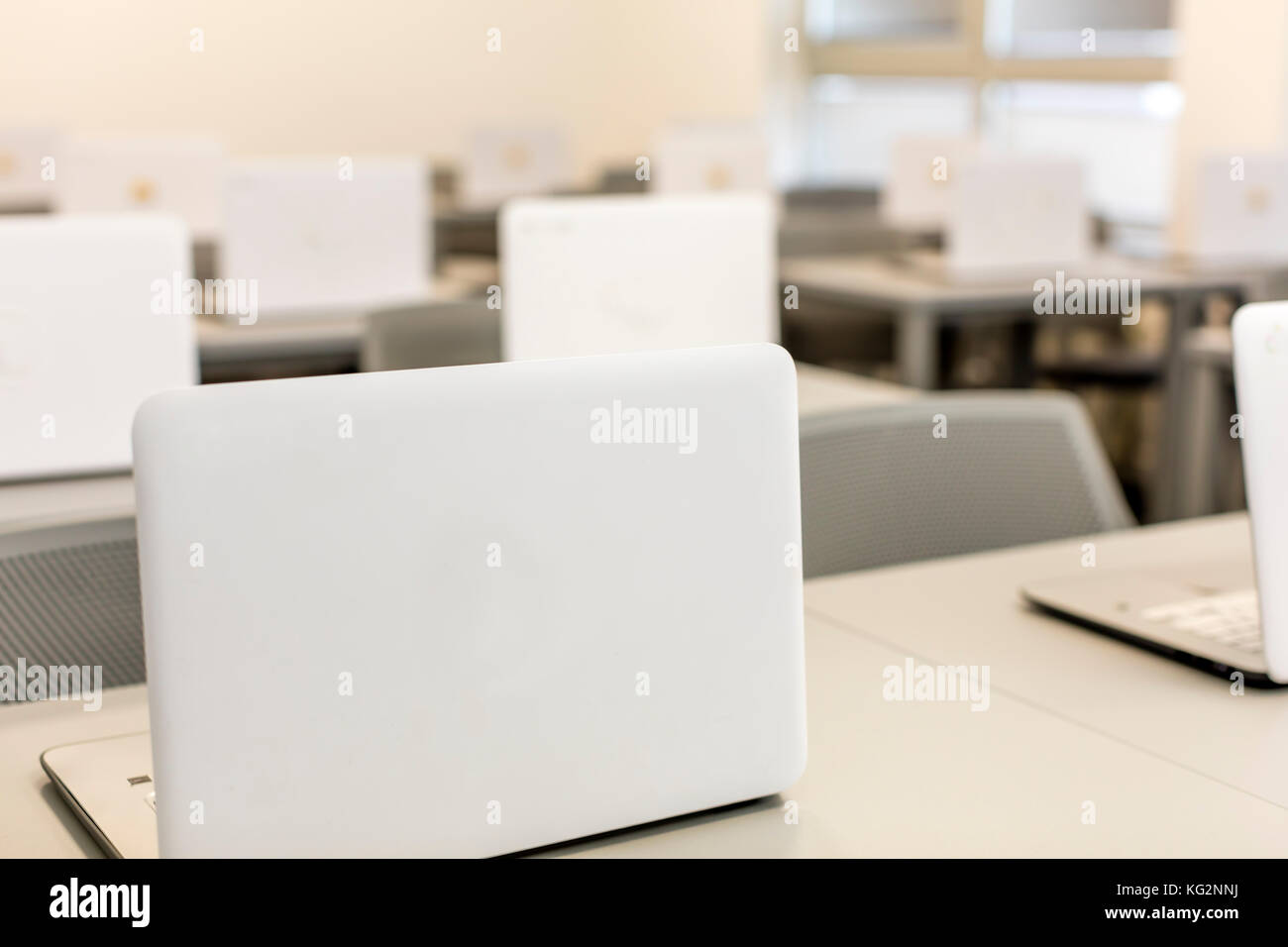 Modern Office Work Desks With Laptops In Depth Photography Stock