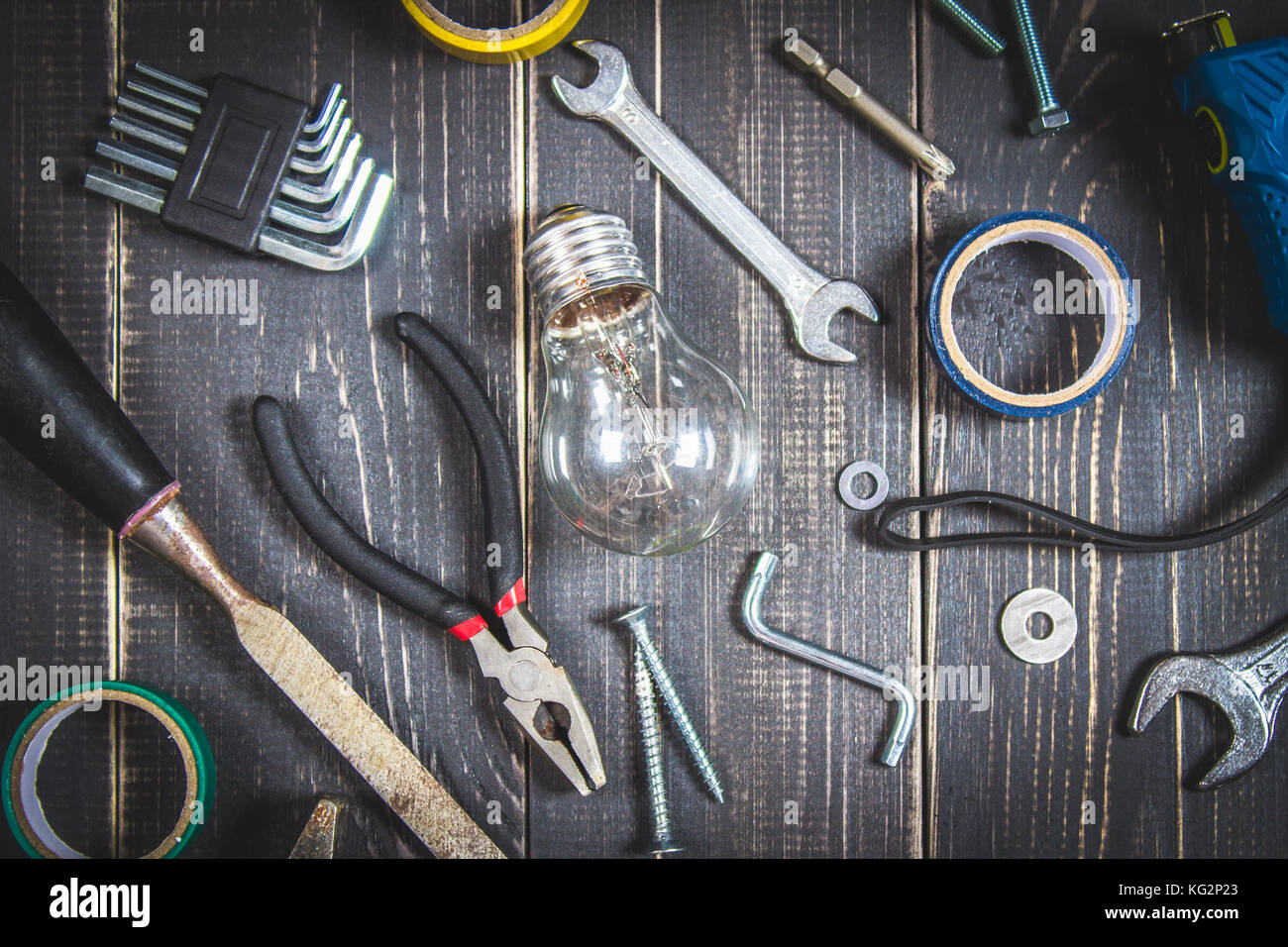 Joinery tools on a dark wooden table. Place for the text. A concept for Father's Day. Top view. Flat laying. Stock Photo