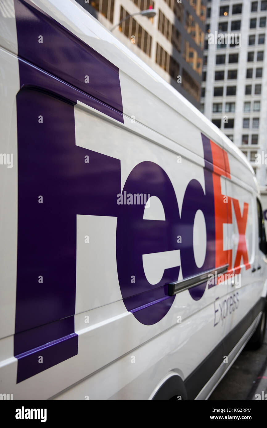 NEW YORK, USA - AUGUST 24, 2017: Detail from FedEx truck in New York, USA. FedEx Corporation is an American multinational courier delivery services co Stock Photo