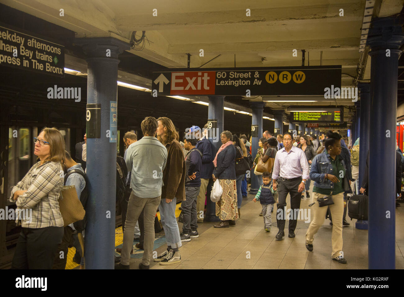 Commuters wait for an uptown No. 6 subway train at 59th Street and ...