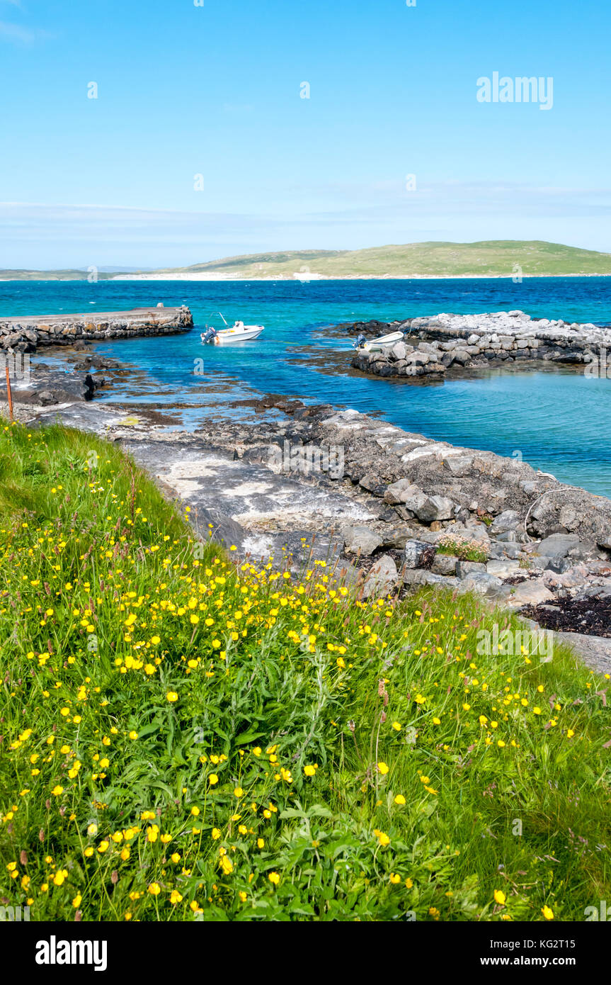 The island of Fuday seen from the small harbour of Eoligarry in the north of Barra, Outer Hebrides. Stock Photo