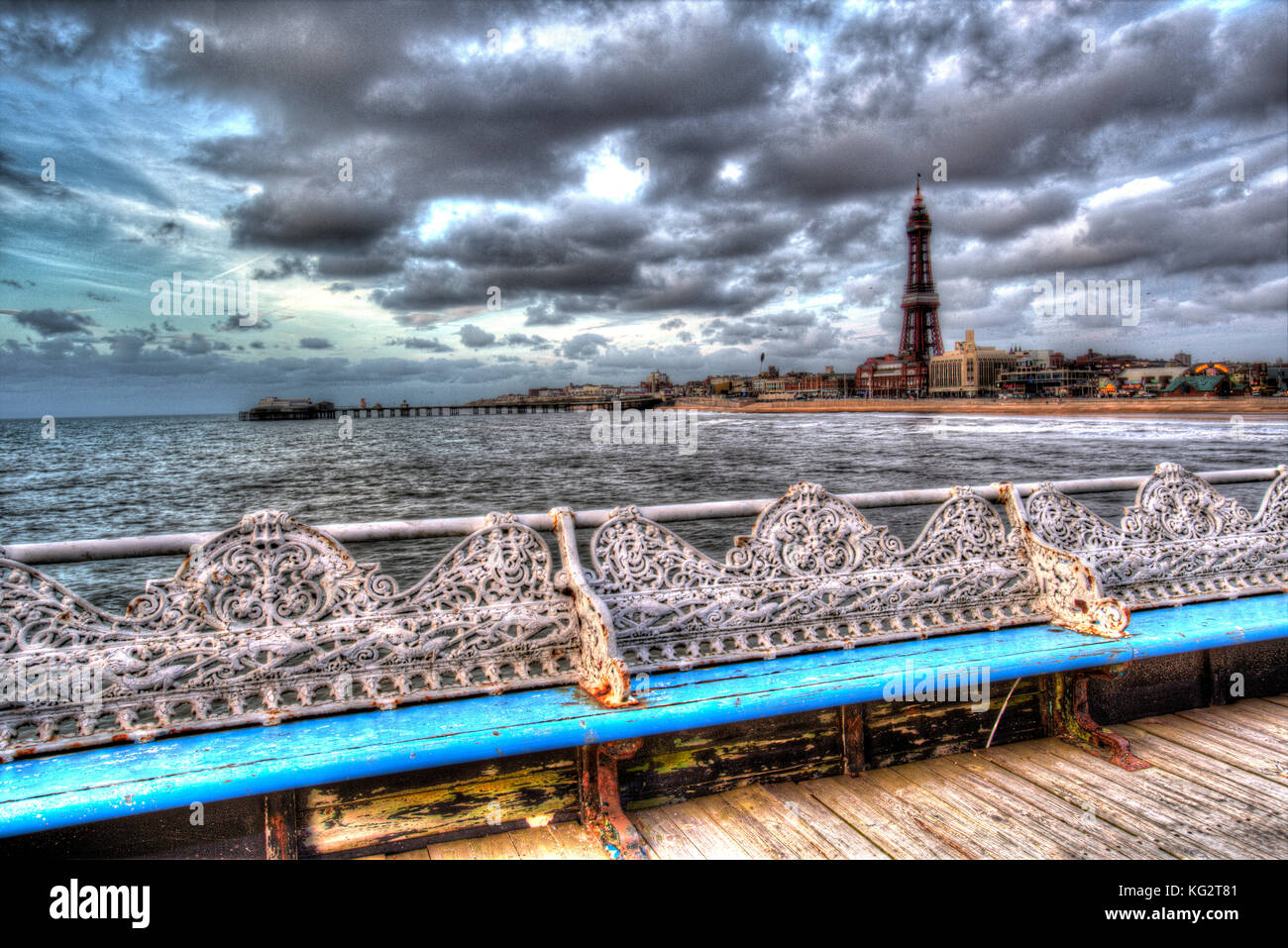 Town of Blackpool, England. Artistic dusk view from Blackpool’s Central Pier with Blackpool Tower and beach in the background. Completed in 1868, the  Stock Photo