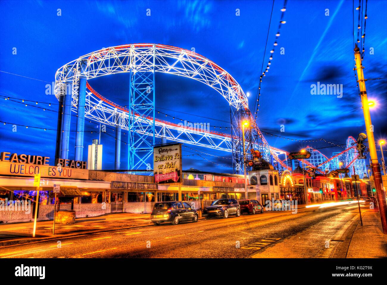 Town of Blackpool, England. Artistic night view of Blackpool Pleasure Beach. This photograph has been produced by merging three differently exposed im Stock Photo