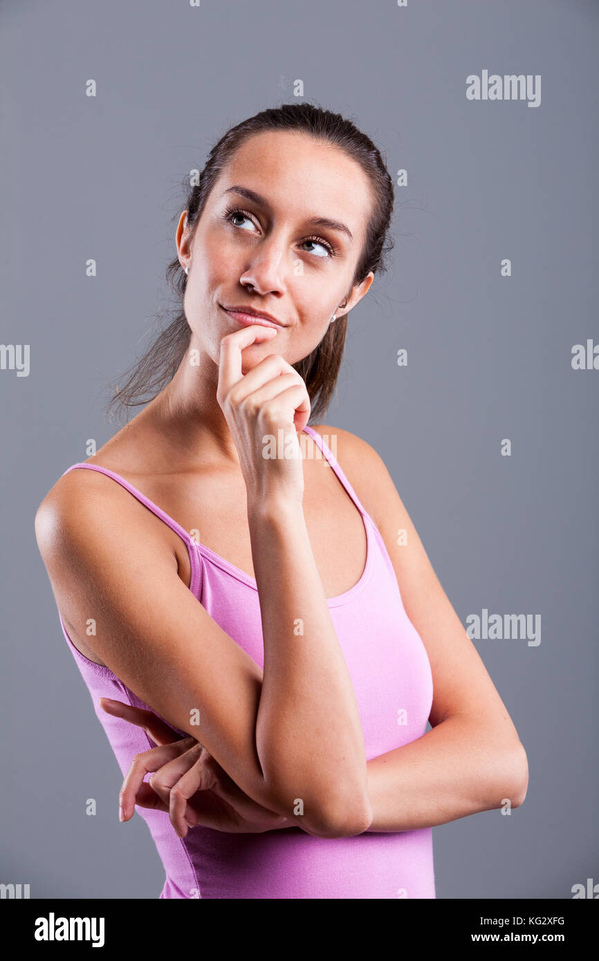 woman thinking about future dreaming imagining and having great ideas Stock Photo