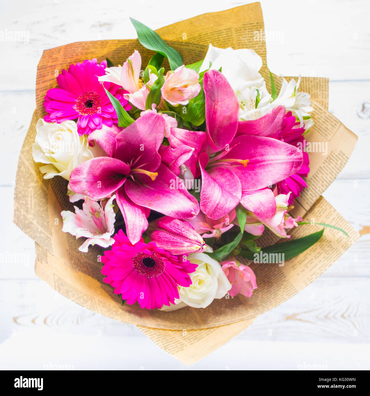 A Bouquet Of Flowers From A Lily Gerbera White Roses And