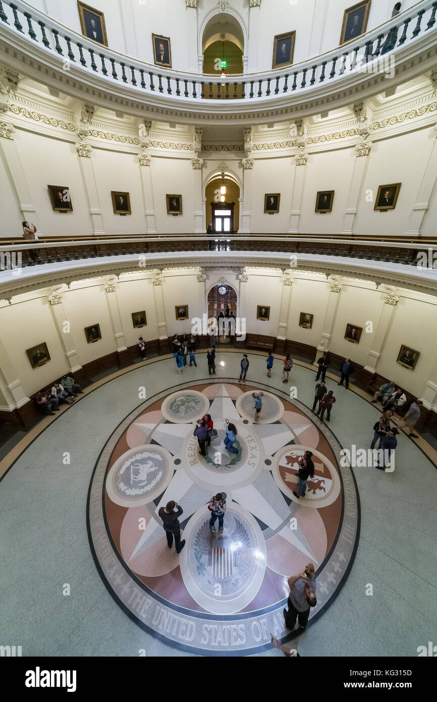 Mosaic showing the seals of the six nations that have governed Texas and rotunda in State Capitol in Austin, TX Stock Photo
