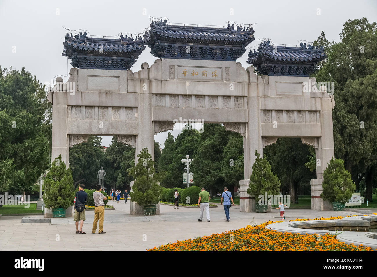 Triple gates in old traditional park in Beijing, China Stock Photo Alamy