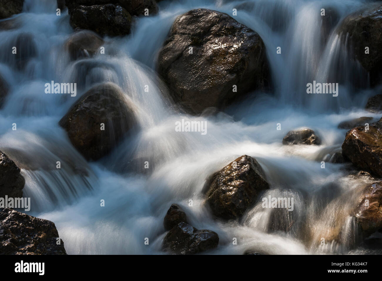 Fast flowing river rocks sunlight hi-res stock photography and images ...