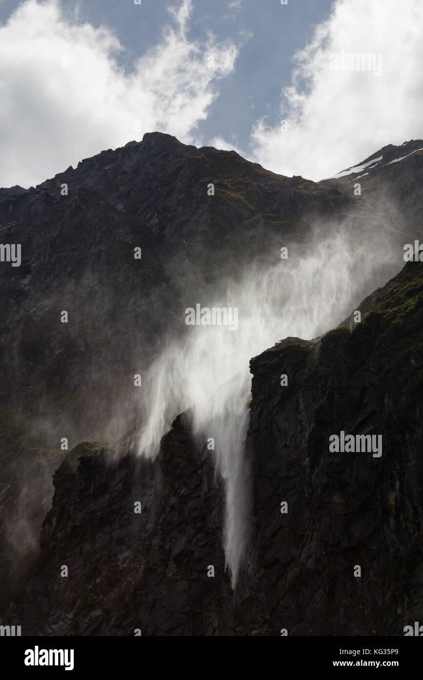 Wind-swept waterfalls ear the end of the Rob Roy Glacier walk near Wanaka, New Zealand Stock Photo
