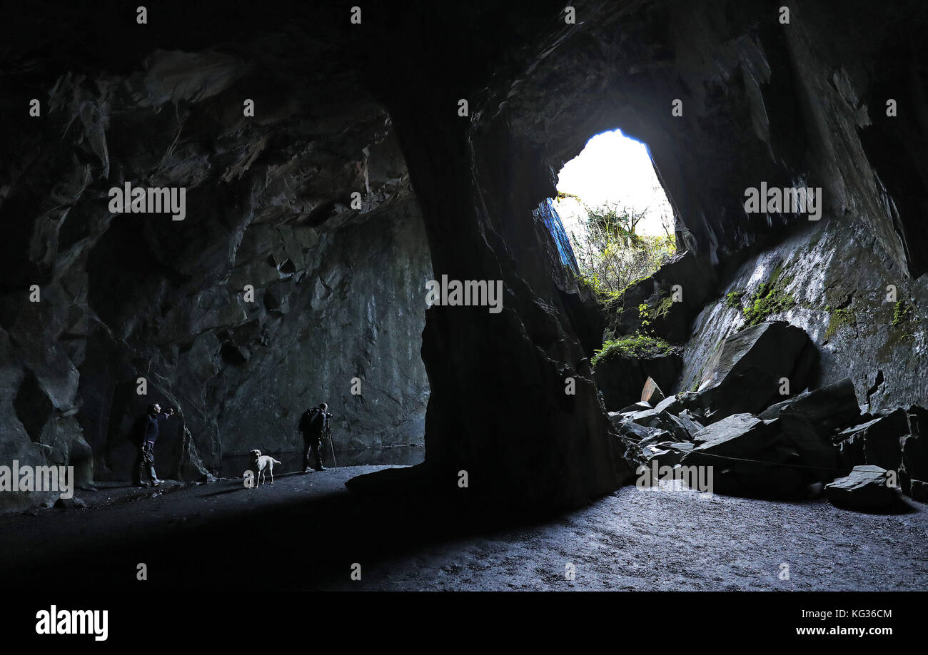 People visit the Cathedral cave, part of the Cathedral quarries in Langdale, in the Lake