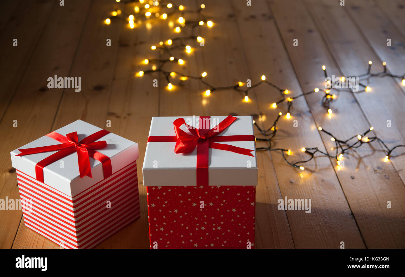 34 in. Pre-Lit Stack of Red Gift Boxes Decoration, White Lights