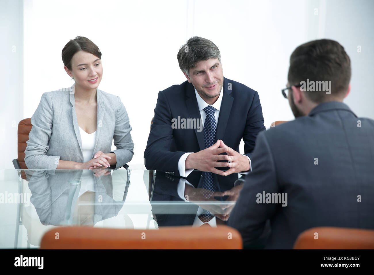 concept of partnership. jurists are discussing a contractual agreement. Stock Photo