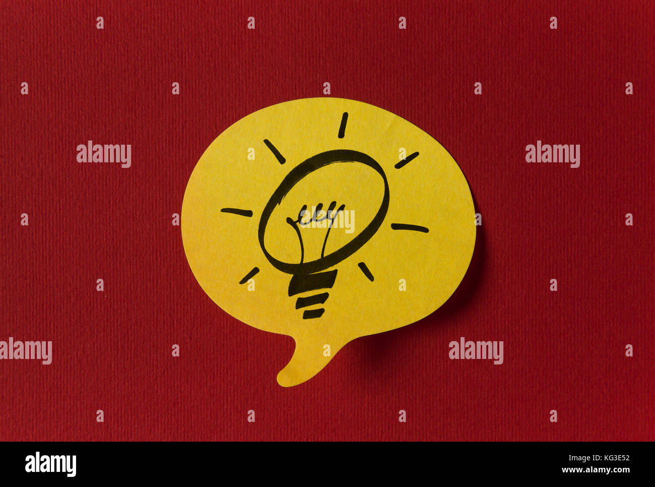 Yellow sticker with shape of speech bubble on red background Stock ...