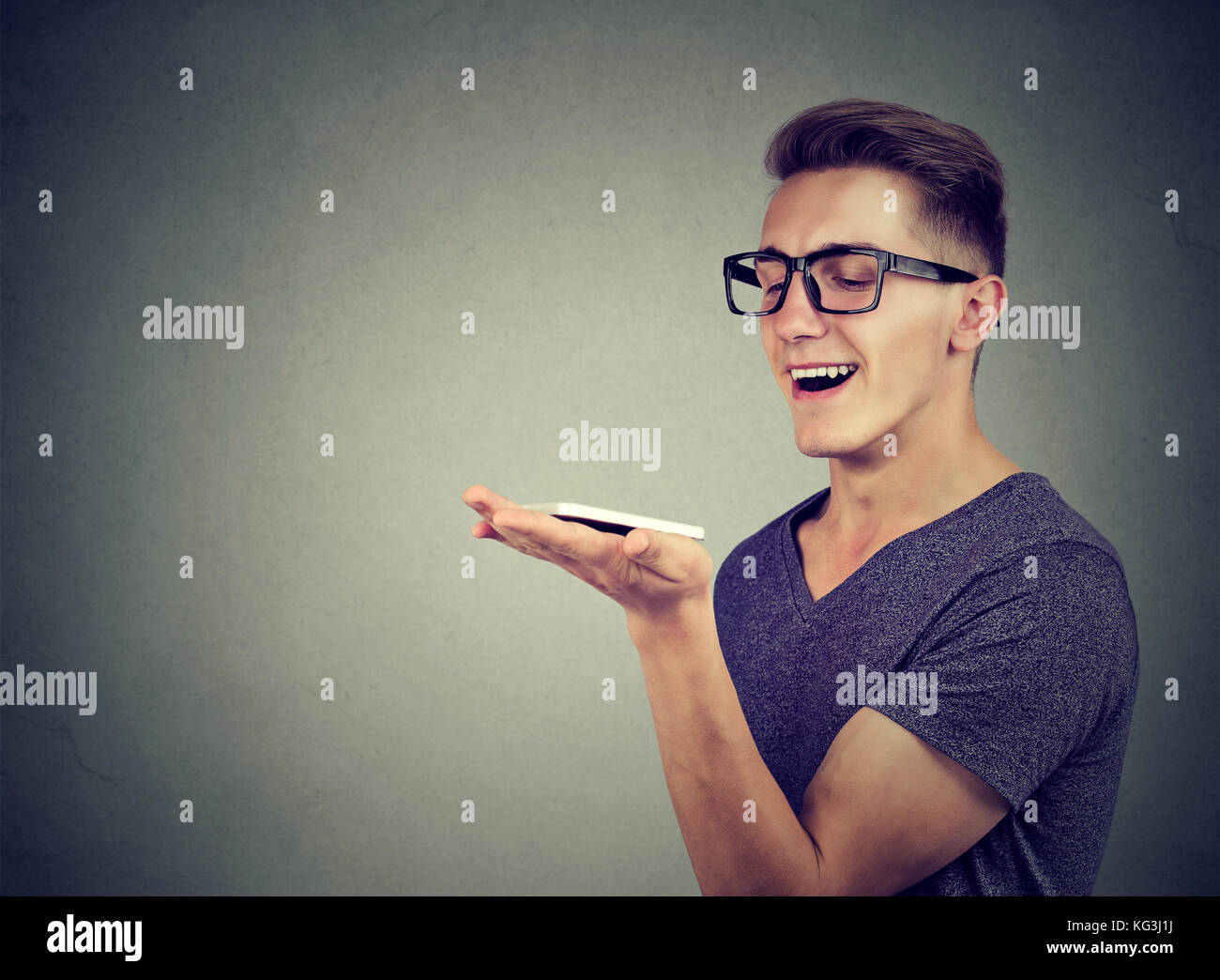 speech recognition concept. hands free communication. Man using smart phone Stock Photo