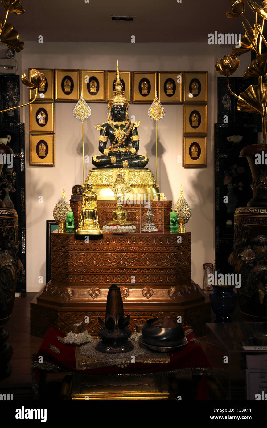 Colombo Sri Lanka Slave Island Gangaramaya Temple Buddha Statue with the Dhyana Mudra and seated in the Ardha Padmasana Position Stock Photo