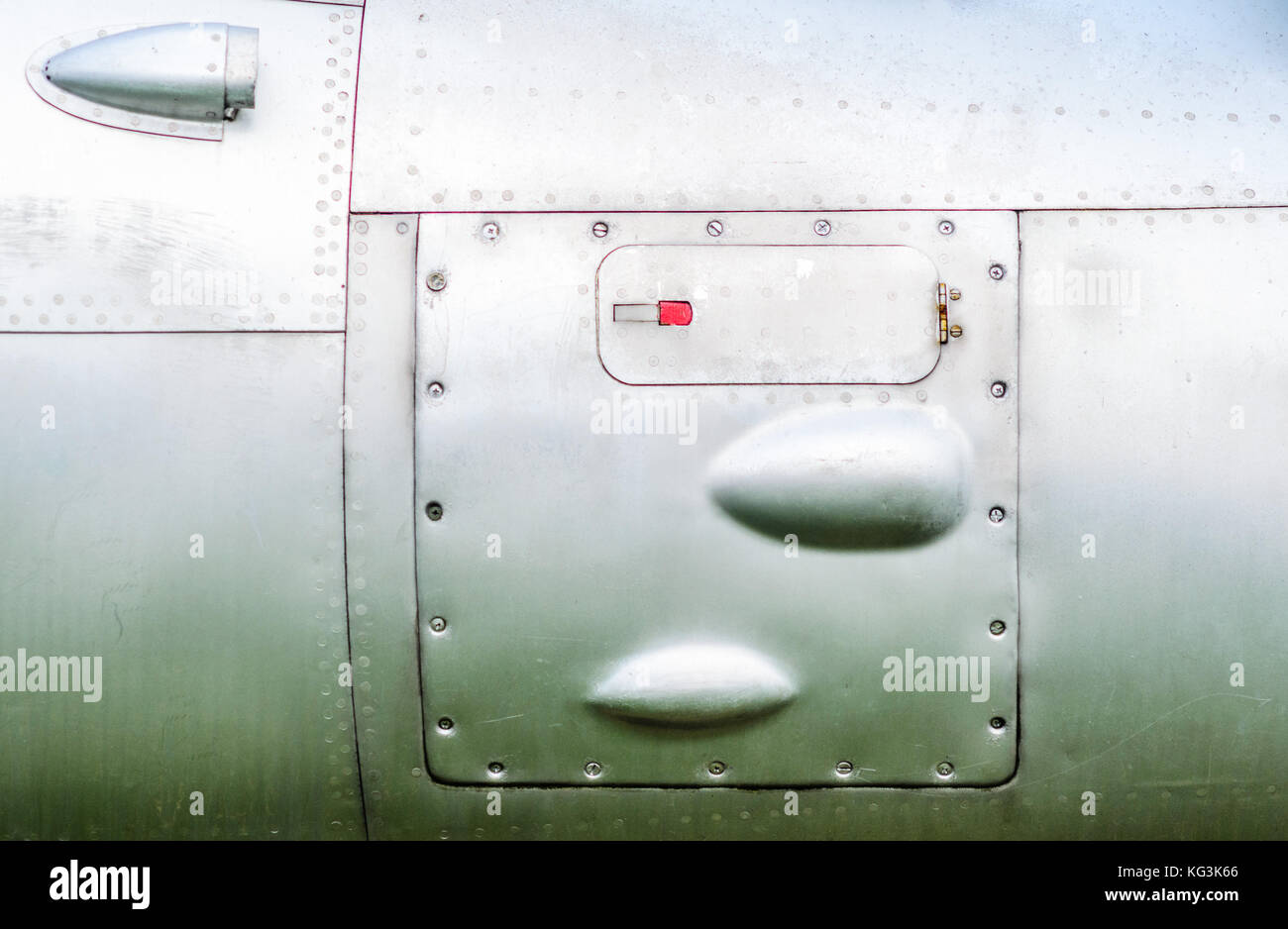 Old aircraft fuselage close up. Door handle and rivets Stock Photo - Alamy