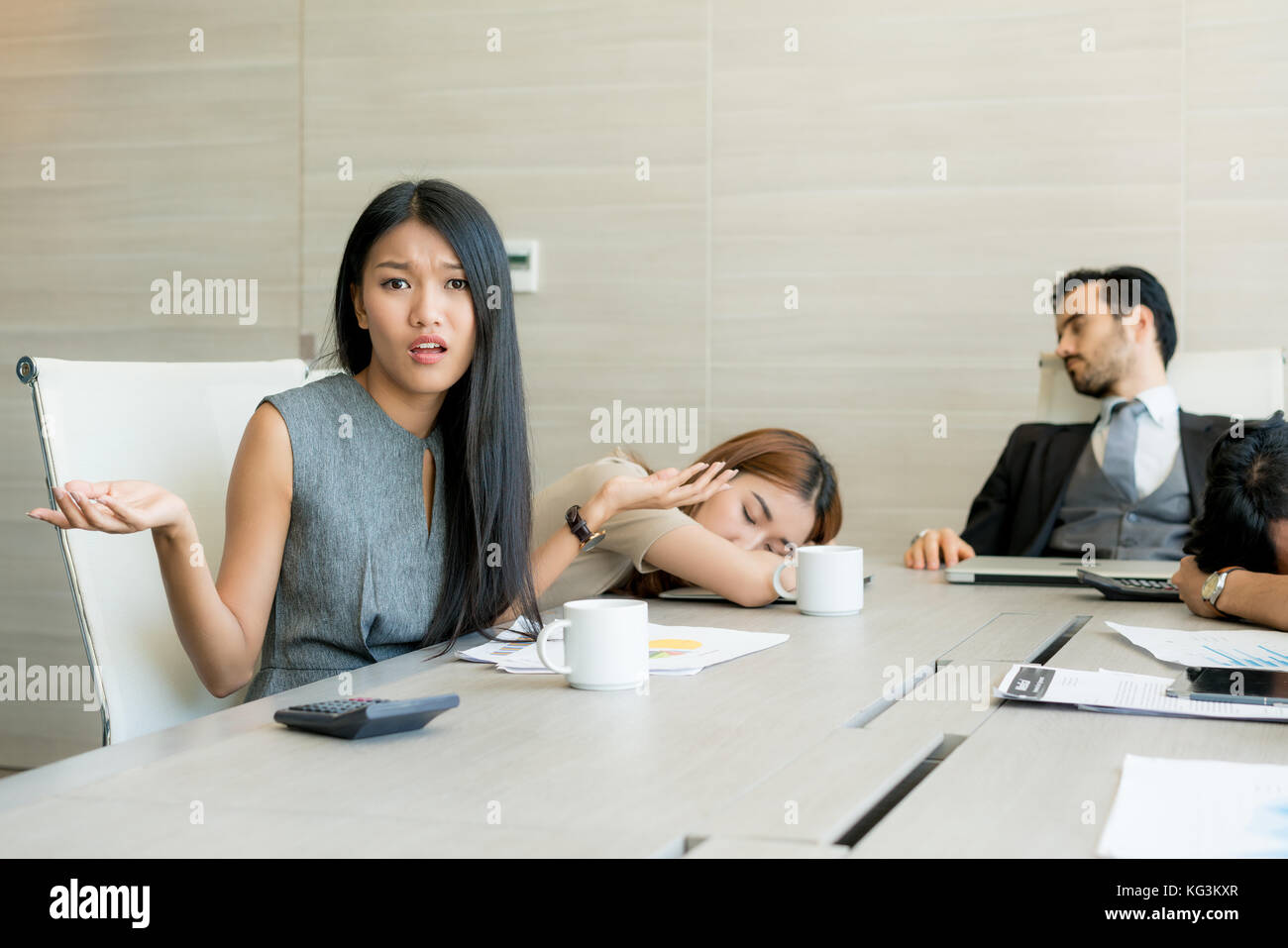 Bored business people and sleeping resting on workplace during work meeting, concept of exhausted businesspeople bored sleep tired. Stock Photo