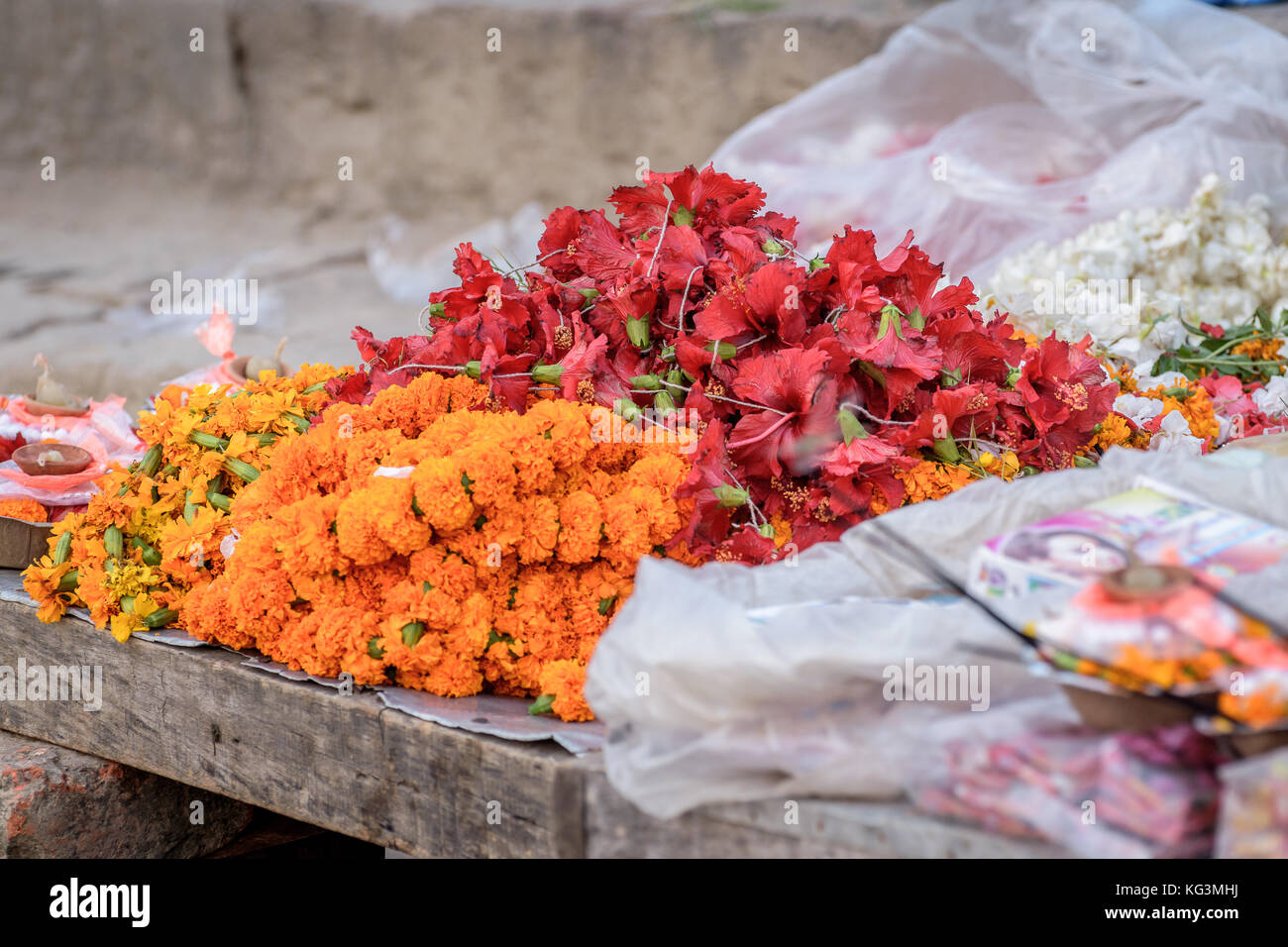 Garlands of flower and utensils for Puja purpose. Selective focus is