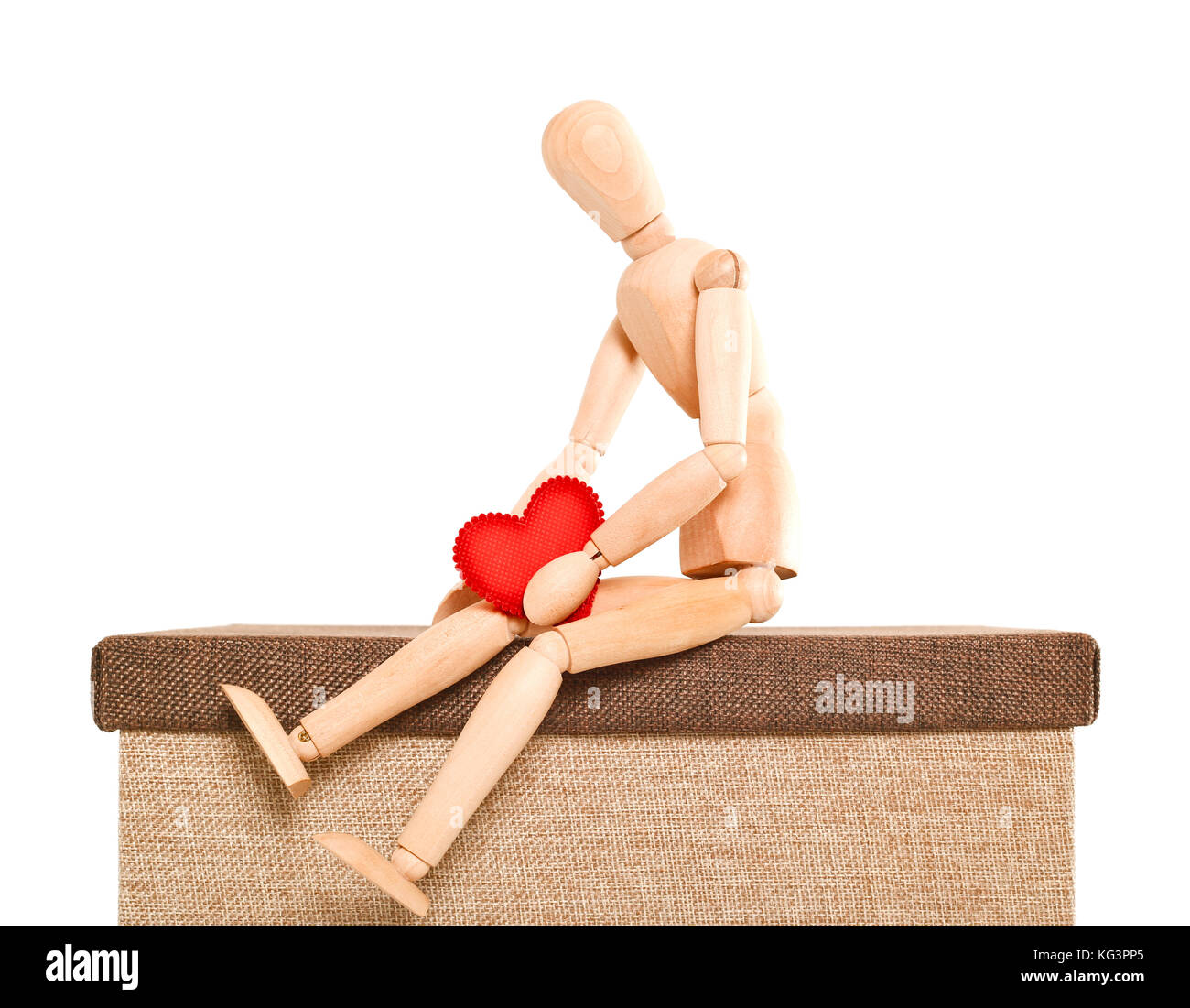 A wooden mannequin in a ballet pose, on it's base, on a white surface Stock  Photo - Alamy