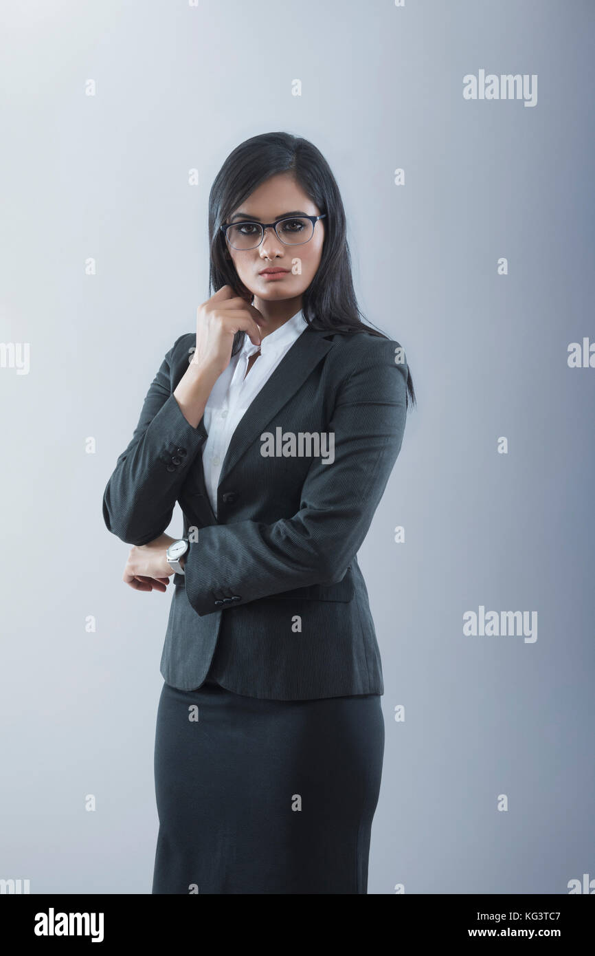 Woman dressed in the suit Stock Photo
