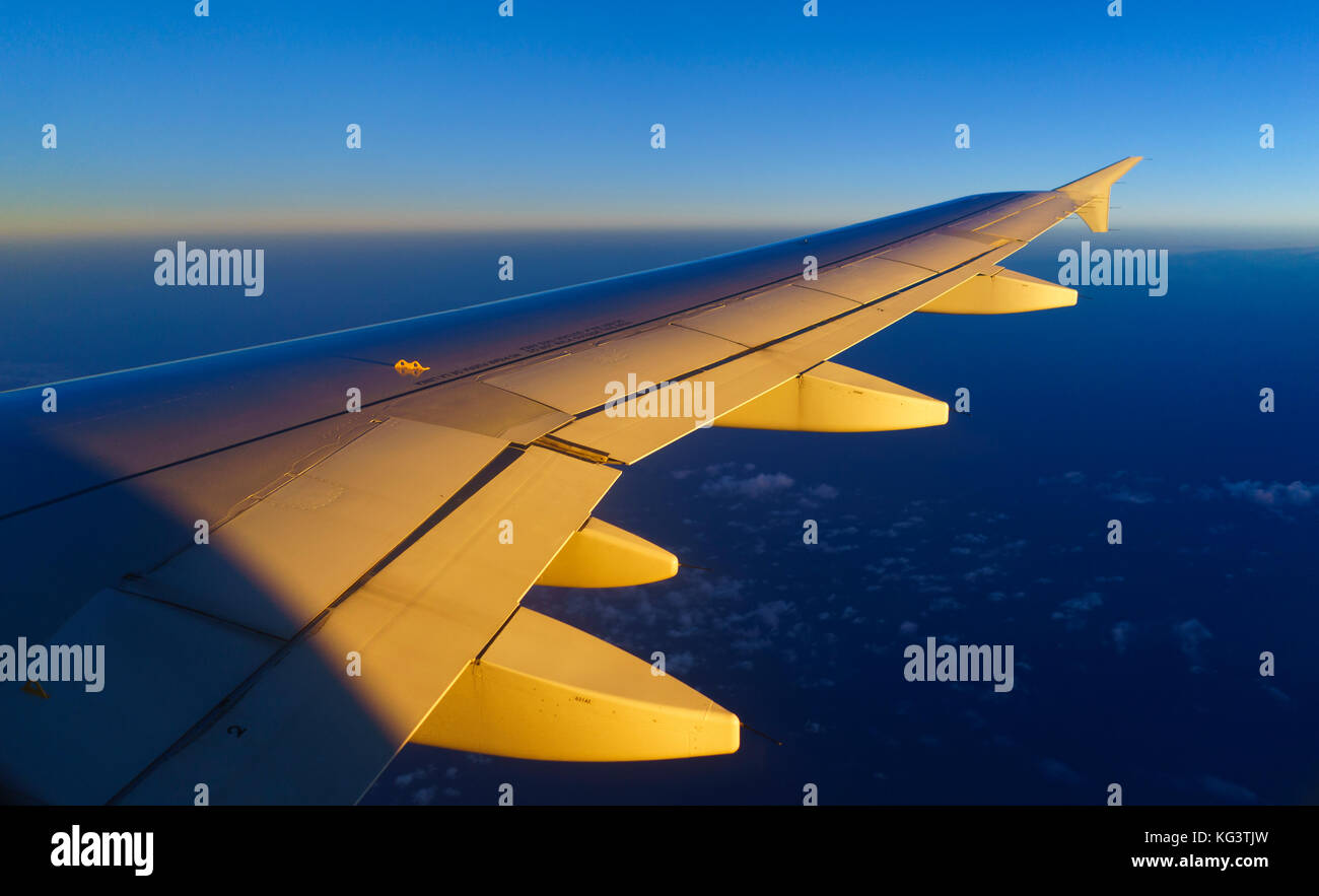 Airplane wing view during sunset hi-res stock photography and images ...