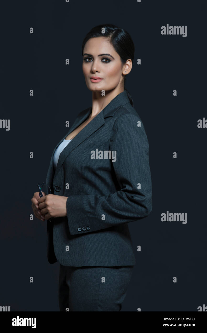 Portrait of young business woman in suit Stock Photo